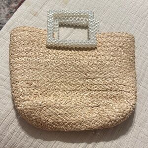 Elegant Tan Woven Clutch with Pearl Accent